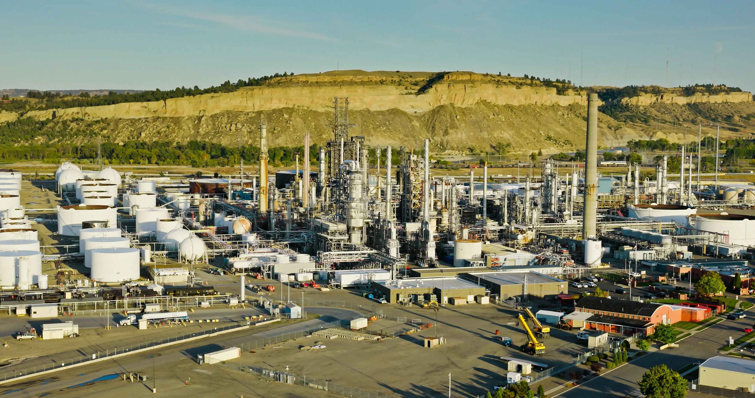 Aerial view of an industrial refinery, representing energy logistics